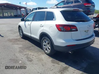 2015 Mazda CX-9 Sport with VIN JM3TB2BV3F0455632, listed as a IAAI auction lot 41881026 with 102,201 mi miles and . Bid and sale history available at carsss.com. Image 3.