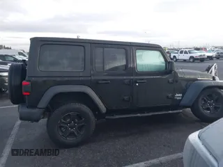 2018 Jeep Wrangler Unlimited Sport z VIN 1C4HJXDNXJW206732, wystawiony jako IAAI lot #41431655 z przebiegiem 38 949 mil mil oraz . Historia ofert i sprzedaży dostępna na DreamBid. Obrazek 13.