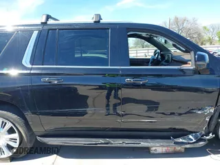 2024 Chevrolet Suburban High Country with VIN 1GNSKGKL7RR150268, listed as a IAAI auction lot 41798479 with 13,339 mi miles and . Bid and sale history available at DreamBid. Image 13.