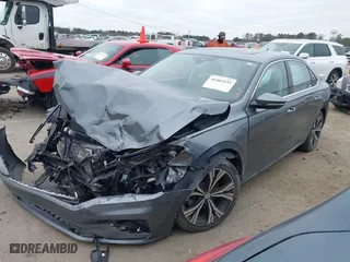 2022 Volkswagen Passat 2.0T SE with VIN 1VWSA7A30NC005824, listed as a IAAI auction lot 41483235 with 33,105 mi miles. Bid and sale history available at carsss.com. Image 2.