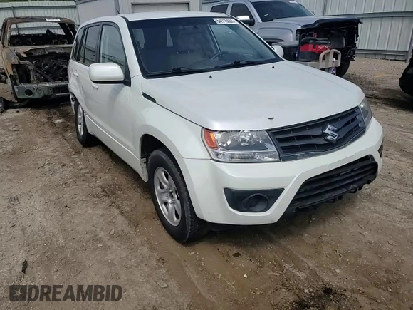 2013 Suzuki Grand Vitara Premium z VIN JS3TE0D62D4100310, wystawiony jako Copart lot #54916065 z przebiegiem 116 428 mil mil oraz Szkoda całkowita • Salvage title. Historia ofert i sprzedaży dostępna na DreamBid. Obrazek 14.