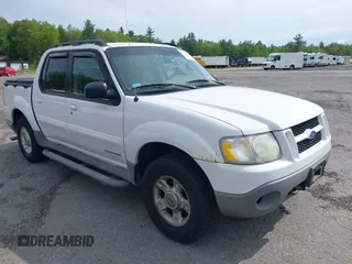 2002 Ford Explorer Sport Trac Value z VIN 1FMZU77E92UB70693, wystawiony jako IAAI lot #42374862 z przebiegiem 144 712 mil mil oraz . Historia ofert i sprzedaży dostępna na DreamBid. Obrazek 1.