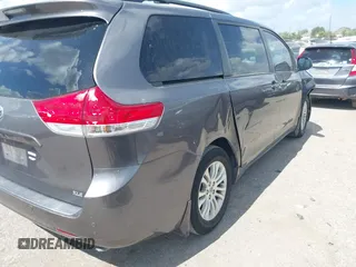 2014 Toyota Sienna XLE with VIN 5TDYK3DC0ES513076, listed as a IAAI auction lot 42724629 with 154,019 mi miles and . Bid and sale history available at DreamBid. Image 4.