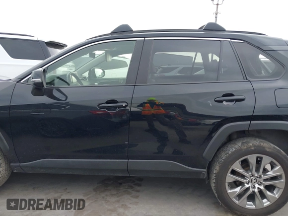 2022 Toyota RAV4 XLE Premium with VIN JTMC1RFV0ND085813, listed as a IAAI auction lot 42152401 with 86,707 mi miles and . Bid and sale history available at DreamBid. Image 14.