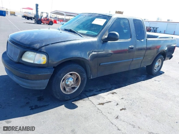 1999 Ford F-150 Work Series with VIN 1FTRX17W5XKB46900, listed as a IAAI auction lot 41792177 with NaN miles. Bid and sale history available at carsss.com. Image 6.