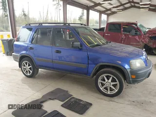 2001 Honda CR-V LX with VIN JHLRD28451C005857, listed as a IAAI auction lot 42004556 with 211,403 mi miles. Bid and sale history available at carsss.com. Image 13.