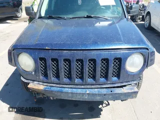 2016 Jeep Patriot Sport with VIN 1C4NJRBBXGD579801, listed as a IAAI auction lot 42040723 with 135,401 mi miles and . Bid and sale history available at carsss.com. Image 13.