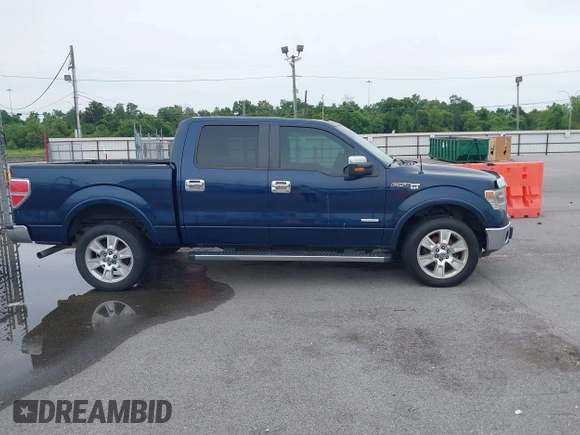 2013 Ford F-150 XL with VIN 1FTFW1ETXDKF51063, listed as a IAAI auction lot 42790441 with 303,665 mi miles and . Bid and sale history available at DreamBid. Image 13.
