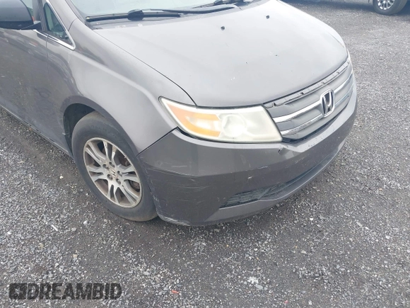 2012 Honda Odyssey EX-L with VIN 5FNRL5H64CB060468, listed as a IAAI auction lot 42182501 with 236,399 mi miles and . Bid and sale history available at carsss.com. Image 6.