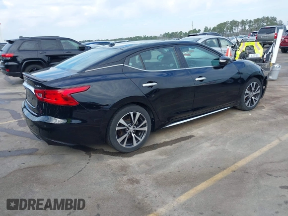 2016 Nissan Maxima SL with VIN 1N4AA6AP3GC426067, listed as a IAAI auction lot 41680265 with 102,450 mi miles and . Bid and sale history available at DreamBid. Image 4.