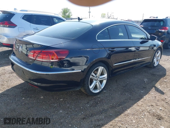 2013 Volkswagen CC Sport with VIN WVWBN7AN9DE518789, listed as a IAAI auction lot 41915400 with 114,847 mi miles. Bid and sale history available at carsss.com. Image 4.