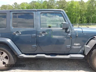 2007 Jeep Wrangler Unlimited Sahara with VIN 1J4GA59117L216687, listed as a IAAI auction lot 42188257 with 176,507 mi miles and . Bid and sale history available at DreamBid. Image 14.
