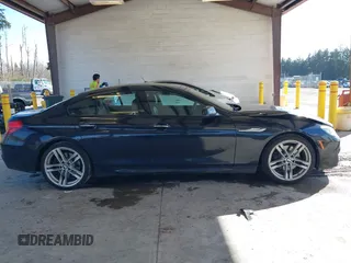 2014 BMW 6 Series 640i xDrive with VIN WBA6B8C5XED452416, listed as a IAAI auction lot 41851885 with 111,445 mi miles and . Bid and sale history available at carsss.com. Image 13.