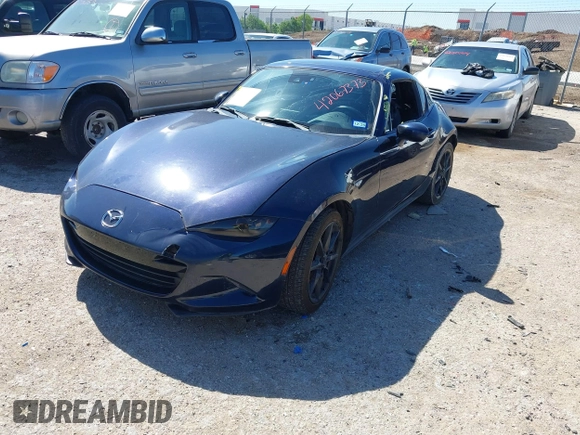 2021 Mazda MX-5 Miata Grand Touring with VIN JM1NDAM7XM0455743, listed as a IAAI auction lot 42067373 with 28,255 mi miles and . Bid and sale history available at DreamBid. Image 17.