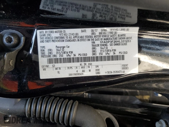 2017 Ford Focus SE with VIN 1FADP3F26HL331253, listed as a Copart auction lot 50869865 with 60,776 mi miles and Salvage title. Bid and sale history available at DreamBid. Image 13.