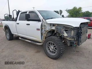2012 Ram 2500 ST z VIN 3C6UD5HL7CG151684, wystawiony jako IAAI lot #42254751 z przebiegiem 205 423 mil mil oraz . Historia ofert i sprzedaży dostępna na DreamBid. Obrazek 1.