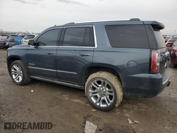 2019 GMC Yukon Denali with VIN 1GKS2CKJ3KR378827, listed as a Copart auction lot 45002325 with 74,283 mi miles and Salvage Title. Bid and sale history available at carsss.com. Image 2.