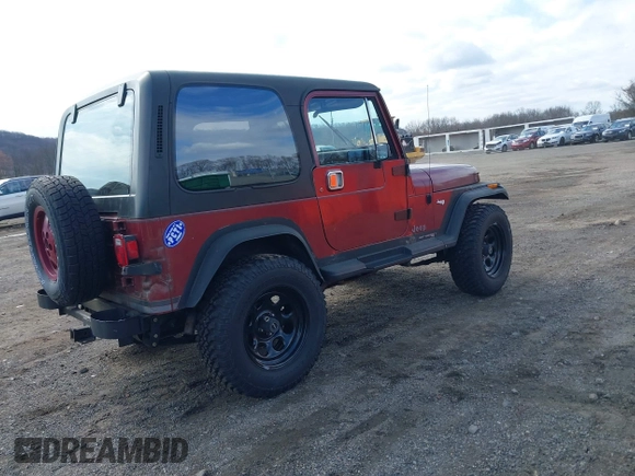 1987 Jeep Wrangler Laredo with VIN 2BCCZ8148HB535575, listed as a IAAI auction lot 41889583 with 221,521 mi miles. Bid and sale history available at carsss.com. Image 4.