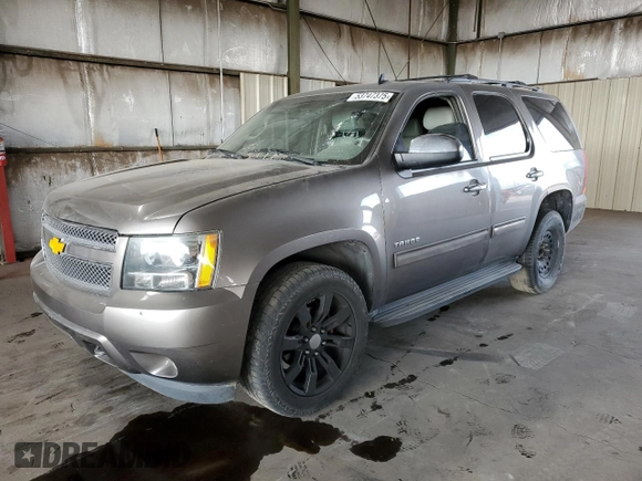 2014 Chevrolet Tahoe LT with VIN 1GNSCBE06ER245772, listed as a Copart auction lot 53747375 with 221,139 mi miles and Salvage title. Bid and sale history available at DreamBid. Image 1.