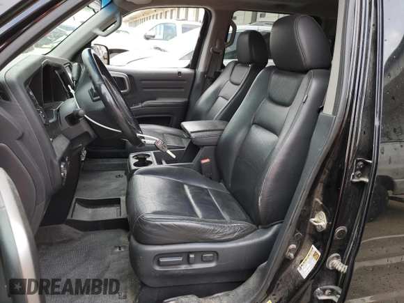 2012 Honda Ridgeline RTL with VIN 5FPYK1F5XCB455246, listed as a Copart auction lot 52871925 with 179,755 mi miles and Salvage title. Bid and sale history available at DreamBid. Image 7.