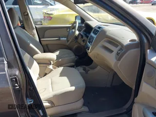 2010 Kia Sportage LX with VIN KNDKGCA32A7697677, listed as a IAAI auction lot 41694920 with 158,212 mi miles and . Bid and sale history available at carsss.com. Image 5.