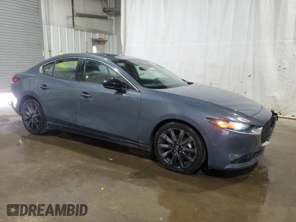 2024 Mazda 3 S Carbon Edition with VIN 3MZBPBCM7RM411319, listed as a Copart auction lot 62766705 with 30,500 mi miles and Non repairable. Bid and sale history available at DreamBid. Image 4.
