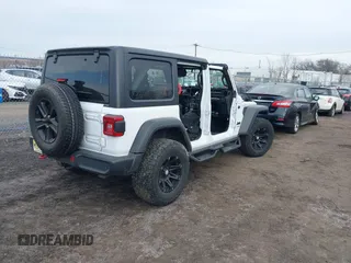 2021 Jeep Wrangler Unlimited Sport S with VIN 1C4HJXDN0MW612698, listed as a IAAI auction lot 41649323 with 22,539 mi miles and . Bid and sale history available at DreamBid. Image 4.