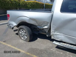 2014 Ford F-150 XL with VIN 1FTEX1CM2EFB01776, listed as a IAAI auction lot 41806274 with 157,704 mi miles. Bid and sale history available at carsss.com. Image 6.