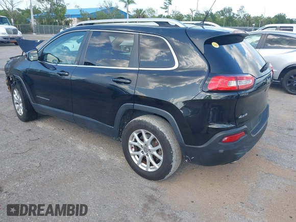 2014 Jeep Cherokee Altitude with VIN 1C4PJMCB5EW146365, listed as a IAAI auction lot 42021350 with 120,652 mi miles and . Bid and sale history available at DreamBid. Image 3.