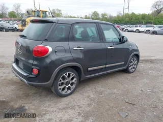 2014 FIAT 500L Trekking with VIN ZFBCFADHXEZ011031, listed as a IAAI auction lot 42094509 with 74,132 mi miles. Bid and sale history available at carsss.com. Image 4.
