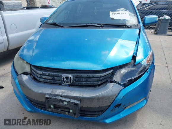 2010 Honda Insight EX with VIN JHMZE2H71AS003290, listed as a IAAI auction lot 42601332 with 163,510 mi miles and . Bid and sale history available at DreamBid. Image 6.