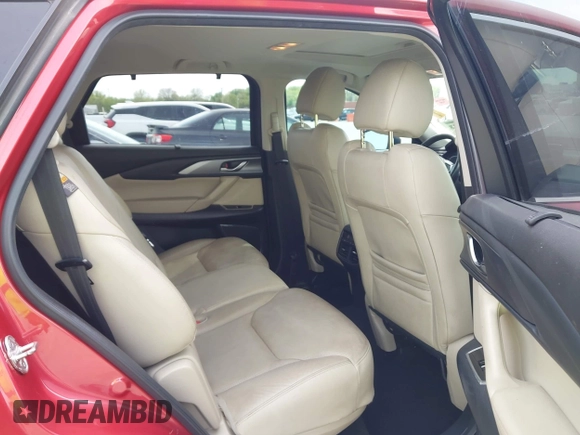2016 Mazda CX-9 Touring with VIN JM3TCACY4G0112961, listed as a IAAI auction lot 42094718 with 114,679 mi miles and . Bid and sale history available at DreamBid. Image 8.