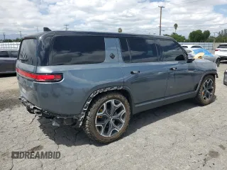 2022 Rivian R1S Launch Edition z VIN 7PDSGABL5NN001018, wystawiony jako Copart lot #56914725 z przebiegiem 26 156 mil mil oraz Szkoda całkowita • Salvage title. Historia ofert i sprzedaży dostępna na DreamBid. Obrazek 3.