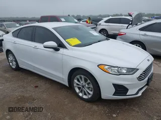 2020 Ford Fusion SE z VIN 3FA6P0LU2LR266943, wystawiony jako IAAI lot #42160987 z przebiegiem 61 435 mil mil oraz . Historia ofert i sprzedaży dostępna na DreamBid. Obrazek 1.