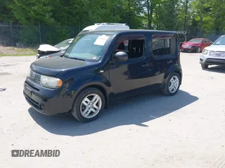 2014 Nissan Cube SL z VIN JN8AZ2KR3ET351190, wystawiony jako IAAI lot #42365065 z przebiegiem 164 703 mil mil oraz . Historia ofert i sprzedaży dostępna na DreamBid. Obrazek 2.