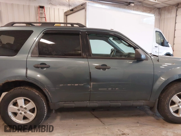 2012 Ford Escape XLT with VIN 1FMCU0D70CKC11664, listed as a IAAI auction lot 42280506 with 184,034 mi miles and . Bid and sale history available at DreamBid. Image 13.