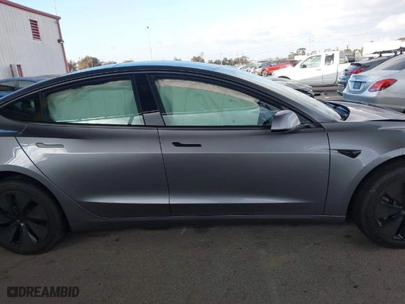 2025 Tesla Model 3 Long Range with VIN 5YJ3E1EBXSF912475, listed as a IAAI auction lot 41449488 with 3,100 mi miles. Bid and sale history available at carsss.com. Image 13.