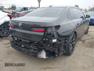 2024 BMW 7 Series 740i with VIN WBA23EH01RCP35452, listed as a IAAI auction lot 42064471 with 13,657 mi miles and . Bid and sale history available at DreamBid. Image 4.