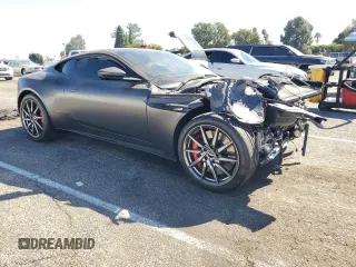 2018 Aston Martin DB11 z VIN SCFRMFAV1JGL05008, wystawiony jako Copart lot #77024394 z przebiegiem Nie podano mil oraz Szkody całkowita. Historia ofert i sprzedaży dostępna na DreamBid. Obrazek 4.