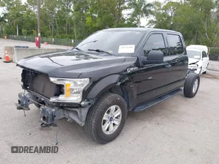 2019 Ford F-150 XL with VIN 1FTFW1E56KFB72035, listed as a IAAI auction lot 41974489 with 116,136 mi miles. Bid and sale history available at carsss.com. Image 2.