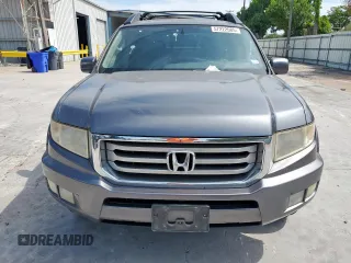 2014 Honda Ridgeline RTL z VIN 5FPYK1F53EB004694, wystawiony jako Copart lot #57222085 z przebiegiem 128 210 mil mil oraz Szkoda całkowita • Salvage title. Historia ofert i sprzedaży dostępna na DreamBid. Obrazek 5.