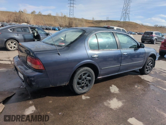 1997 Nissan Maxima GXE with VIN JN1CA21D0VT201140, listed as a Copart auction lot 52230495 with 286,440 mi miles and Clean title. Bid and sale history available at DreamBid. Image 3.