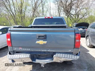 2014 Chevrolet Silverado 1500 LT with VIN 3GCUKREH9EG313565, listed as a IAAI auction lot 42003086 with 112,322 mi miles and . Bid and sale history available at DreamBid. Image 16.