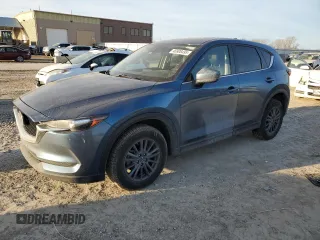 2020 Mazda CX-5 Touring with VIN JM3KFBCM9L0737243, listed as a Copart auction lot 46908495 with 76,956 mi miles and Salvage Title. Bid and sale history available at carsss.com. Image 1.