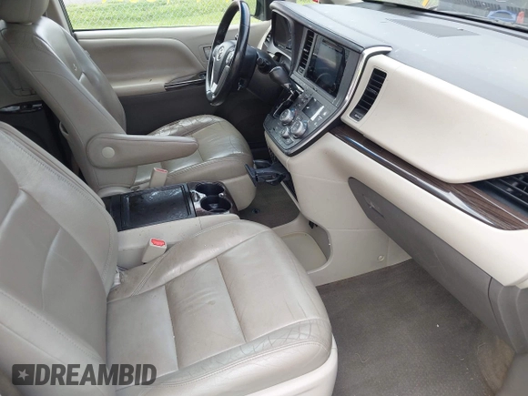 2016 Toyota Sienna XLE z VIN 5TDYK3DC9GS706815, wystawiony jako IAAI lot #42494662 z przebiegiem 141 157 mil mil oraz . Historia ofert i sprzedaży dostępna na DreamBid. Obrazek 5.