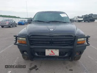 2001 Dodge Dakota Sport with VIN 1B7HG2AN31S225393, listed as a IAAI auction lot 42183298 with 244,961 mi miles and . Bid and sale history available at carsss.com. Image 6.