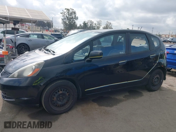 2010 Honda Fit with VIN JHMGE8H21AC039375, listed as a IAAI auction lot 42126138 with 123,077 mi miles. Bid and sale history available at carsss.com. Image 14.