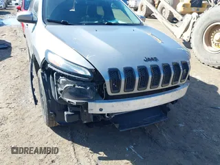 2014 Jeep Cherokee Latitude with VIN 1C4PJMCS7EW310179, listed as a IAAI auction lot 41757831 with 134,087 mi miles and . Bid and sale history available at DreamBid. Image 6.