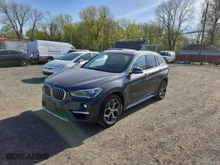 2017 BMW X1 xDrive28i with VIN WBXHT3C32H5F79305, listed as a Copart auction lot 54665865 with 113,046 mi miles and Clean Title. Bid and sale history available at carsss.com. Image 2.