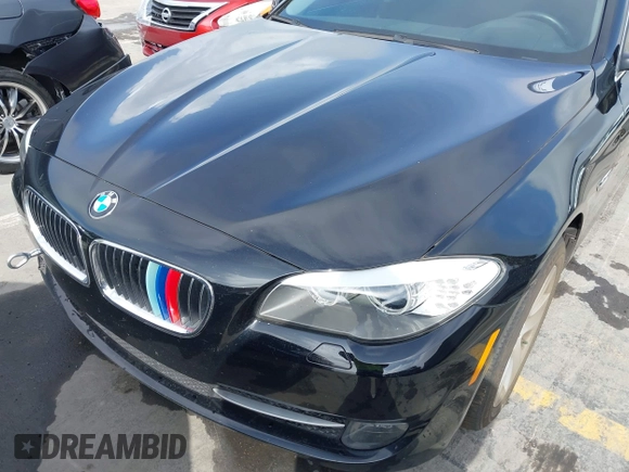 2013 BMW 5 Series 528i with VIN WBAXG5C52DDY32806, listed as a IAAI auction lot 41933388 with 92,360 mi miles and . Bid and sale history available at carsss.com. Image 6.